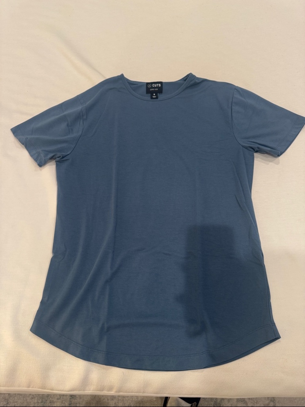 Cuts Clothing Short Sleeve T-Shirt in Dusty Blue Curved Hem